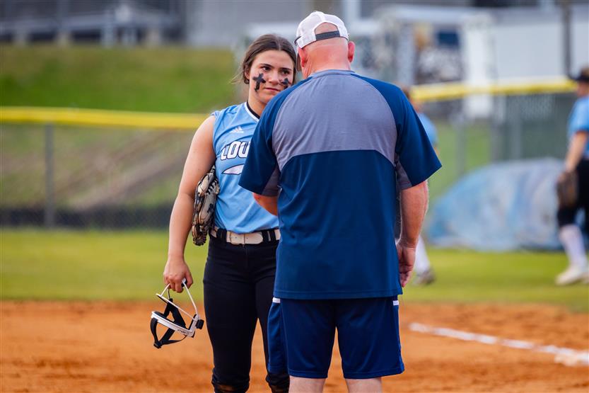 Centennial and Independence High schools play softball